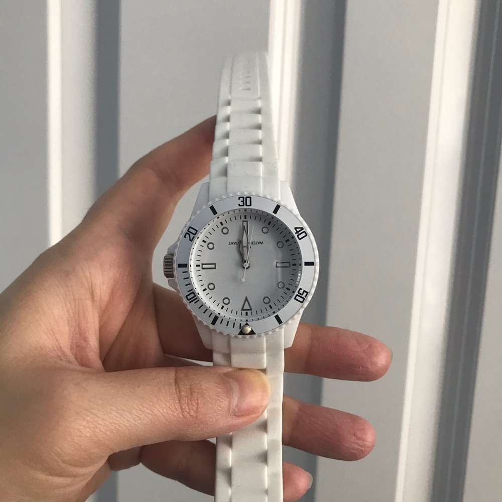 Clarins white watch